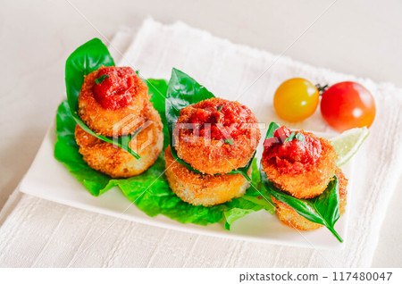 Fried Italian eggplant with tomato chili sauce 117480047