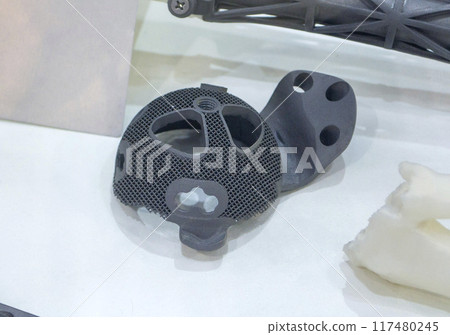 Implant of joint printed on a 3D printer from biocompatible titanium. Individual 3D-handled acetabular system. Endoprosthesis. Biointegrated patient-specific prosthesis. Medicine medical Implant of joint printed on a 3D printer from biocompatible titanium. Individual 3D-handled acetabular system. Endoprosthesis. Biointegrated patient-specific prosthesis. Medicine medical 117480245