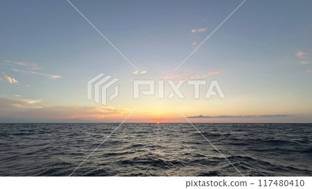 Sunset over the sea 117480410