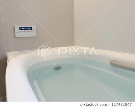 A bathtub filled with hot water 117481947