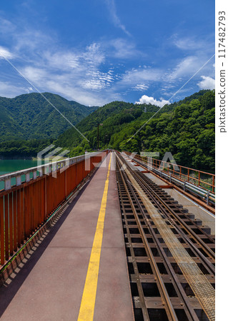 Unexplored station floating on the blue lake surface Unexplored station floating on the blue lake surface 117482793