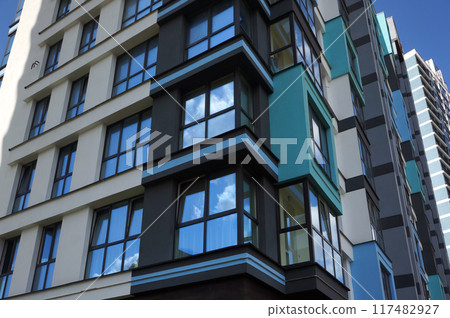Windows on Facade of Modern Multistorey Residential Building. 117482927