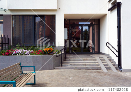 Front Steps and Doors of Entrance to Modern Building. Front Steps and Doors of Entrance to Modern Building. 117482928