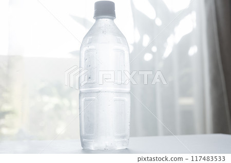 Chilled water: Bottled water placed indoors 117483533
