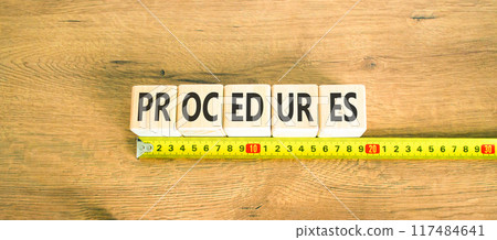 Procedures symbol. Concept word Procedures on beautiful wooden cubes. Beautiful wooden background. Beautiful yellow ruler. Business procedures concept. Copy space. 117484641
