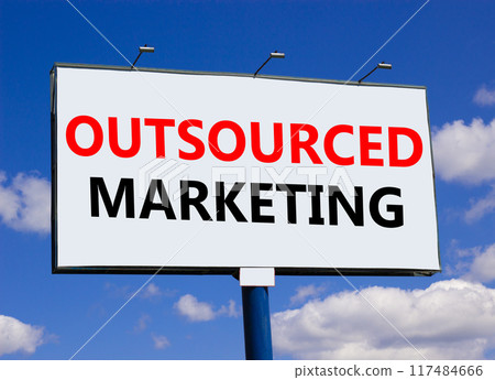 Outsourced marketing symbol. Concept words Outsourced marketing on beautiful white billboard. Beautiful blue sky white cloud background. Business Outsourced marketing concept. Copy space. Outsourced marketing symbol. Concept words Outsourced marketing on beautiful white billboard. Beautiful blue sky white cloud background. Business Outsourced marketing concept. Copy space. 117484666