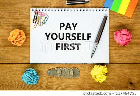 Pay yourself first symbol. Concept words Pay yourself first on beautiful white note. Beautiful wooden background. Black pen. Colored paper. Business and pay yourself first concept. Copy space. Pay yourself first symbol. Concept words Pay yourself first on beautiful white note. Beautiful wooden background. Black pen. Colored paper. Business and pay yourself first concept. Copy space. 117484753
