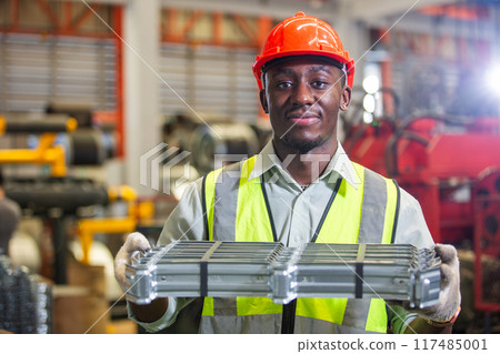 Male african american workers wear red helmet  117485001