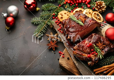 Christmas Dinner for Two. Baked Beef on the Bone with Spices on a Stone Table with a Christmas Tree and New Year's Toys with copy space for your text Christmas Dinner for Two. Baked Beef on the Bone with Spices on a Stone Table with a Christmas Tree and New Year's Toys with copy space for your text 117486295