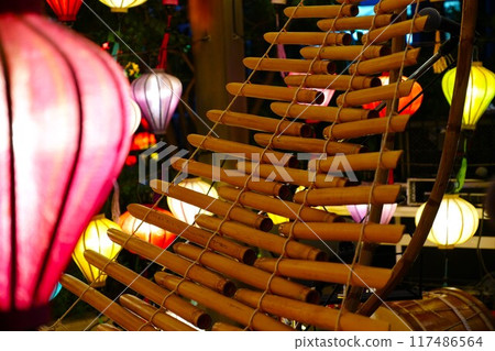 Asian lantern and bamboo folk instrument (torun) Asian lantern and bamboo folk instrument (torun) 117486564