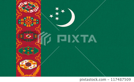 Flag of Turkmenistan. Turkmen flag on fabric surface. Fabric texture 117487509