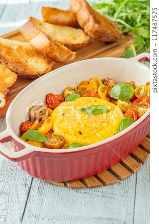 Baked camembert cheese 117487575
