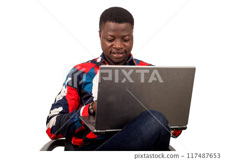 portrait of young african with laptop. portrait of young african with laptop. 117487653