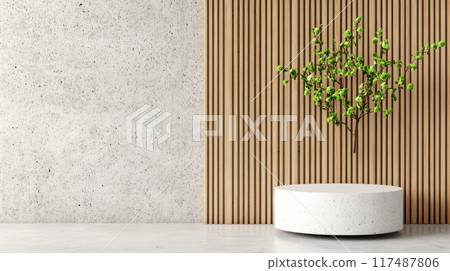 Simple decor featuring a round table with a vase and blossoming branch against a wooden wall 117487806