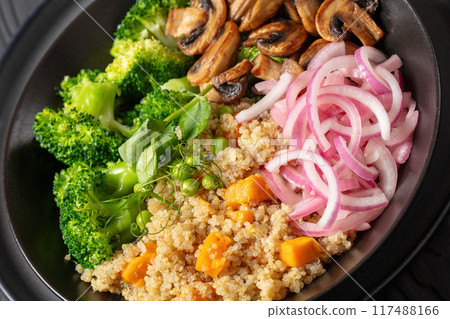 quinoa with veggies and mushrooms in a bowl quinoa with veggies and mushrooms in a bowl 117488166