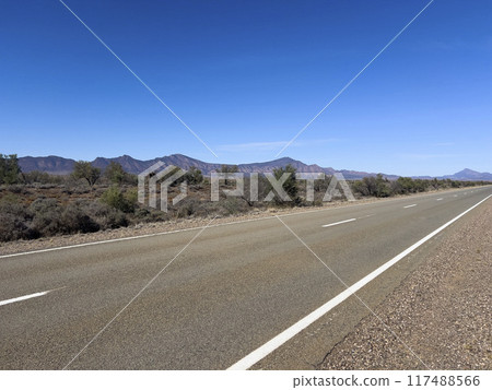 Mountains and dirt road in the Australian Outback 117488566