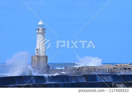 Waves crashing on Ichinoshima Lighthouse in Choshi Port 117488922