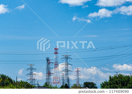 Blue sky and power lines on a hot, sunny day Blue sky and power lines on a hot, sunny day 117489090