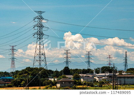 Blue sky and power lines on a hot, sunny day Blue sky and power lines on a hot, sunny day 117489095