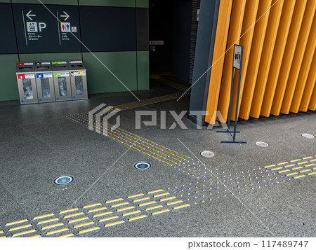 Example of Braille tacks installed in indoor walking areas 117489747