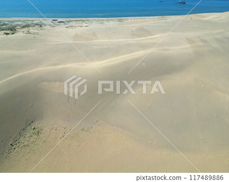Aerial view of the Tottori Sand Dunes in the early morning with no one around Aerial view of the Tottori Sand Dunes in the early morning with no one around 117489886