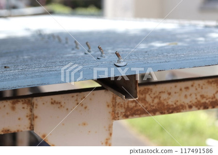Aged iron roof 117491586