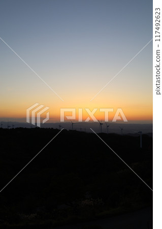 A setting sunset 117492623