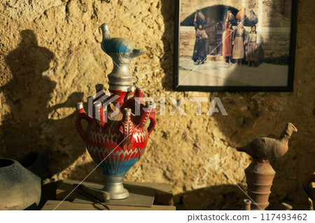 Antique kitchenware in a Middle Eastern home Antique kitchenware in a Middle Eastern home 117493462