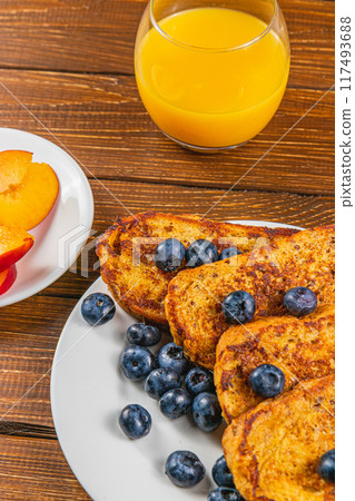 french toast on white plate for breakfast french toast on white plate for breakfast 117493688