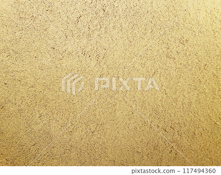 A horizontal background image of a light, sand-colored clay wall with a straw-like texture on the surface A horizontal background image of a light, sand-colored clay wall with a straw-like texture on the surface 117494360