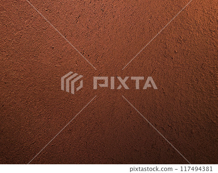 A horizontal background image of a dark reddish brown earthen wall with a straw-like surface 117494381