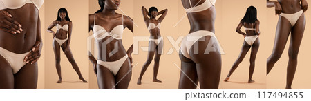 Black woman in beige lingerie posing with different facial expressions and body language against a beige studio background. 117494855
