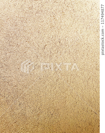 A vertically long background image of a light, whitish brown earthen wall with a surface that has the texture of straw remaining. A vertically long background image of a light, whitish brown earthen wall with a surface that has the texture of straw remaining. 117494877