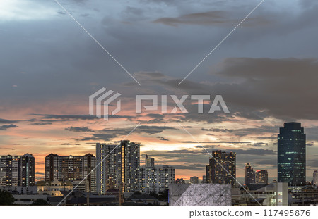 Night city view of Dramatic sky over Large Metropolitan after sunset. 117495876