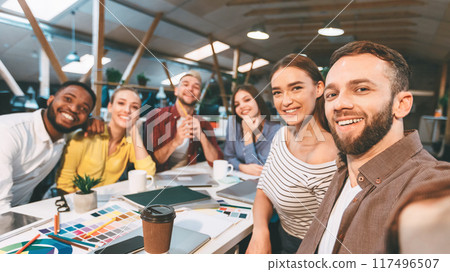 Happy designers making selfie at workplace, working on project with palettes 117496507