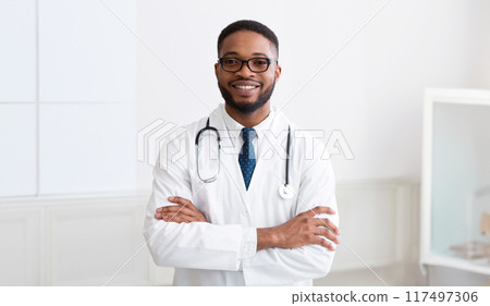 African Medical Doctor Looking At Camera During Conference In Board Room 117497306