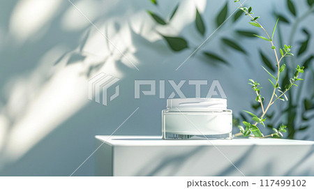 Cosmetic cream in a glass jar on a blue backdrop. Skin care concept. Background for beauty products Cosmetic cream in a glass jar on a blue backdrop. Skin care concept. Background for beauty products 117499102