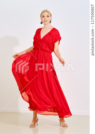 Pretty woman waiving long dress 117500807