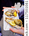 Eat grilled oysters on the go in Miyajima 117501081