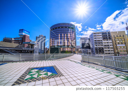 New scenery of Yokohama cityscape in Japan. View of hotels and other facilities from the deck on the new south exit side of Sakuragicho Station = August 17, 2024 117503255