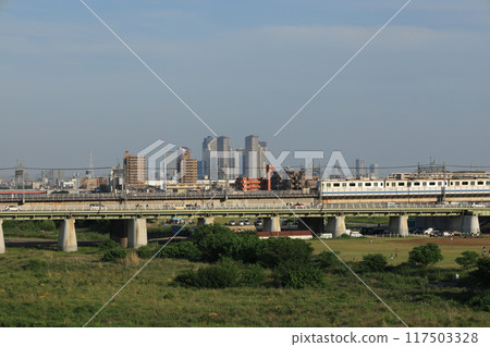 Futako Tamagawa Station and trains seen from the Tama River riverbed Futako Tamagawa Station and trains seen from the Tama River riverbed 117503328