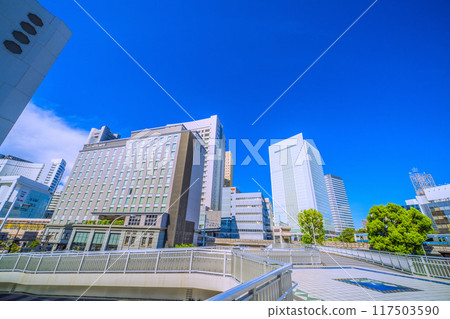 New scenery of the cityscape of Yokohama, Japan. View of the new south exit of Sakuragicho Station, Yokohama City Hall, trains, etc. = August 17, 2024 New scenery of the cityscape of Yokohama, Japan. View of the new south exit of Sakuragicho Station, Yokohama City Hall, trains, etc. = August 17, 2024 117503590