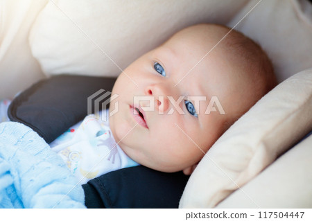 Newborn baby in car seat 117504447