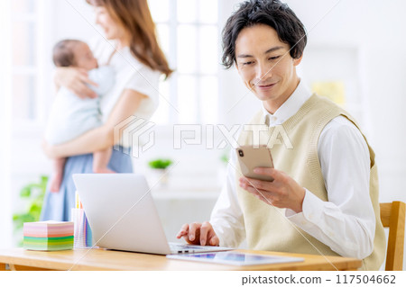 Home-based businessman parenting Home-based businessman parenting 117504662