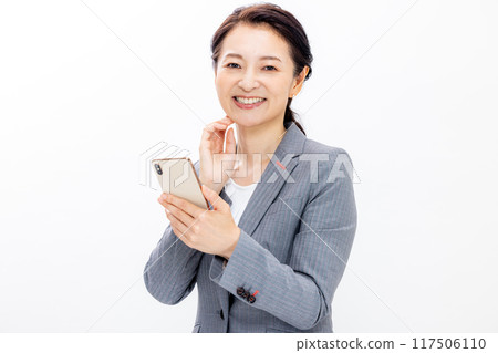 Woman with smartphone Woman with smartphone 117506110
