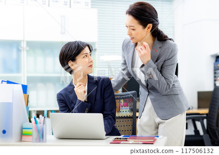 Business woman working in the office Business woman working in the office 117506132