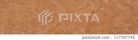 Warm cinnamon swirls on a textured veneer surface evoke natural elegance Warm cinnamon swirls on a textured veneer surface evoke natural elegance 117507748