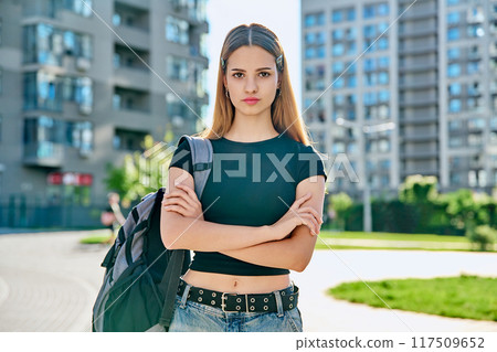 Outdoor portrait young teenager student female with backpack Outdoor portrait young teenager student female with backpack 117509652