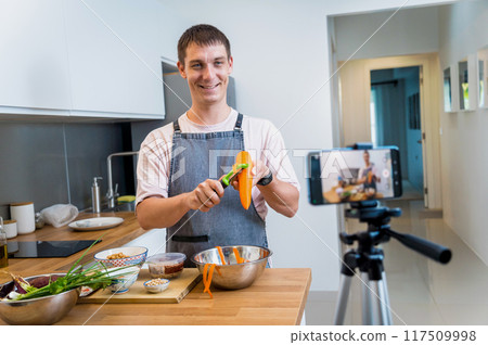 The chef is broadcasting live from workshop how to prepare a vegetarian massaman curry 117509998