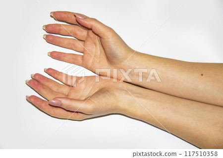 A composition of Women's hands which wanted to hold something light background. Female hands try to catch something. Concept with female hands. A composition of Women's hands which wanted to hold something light background. Female hands try to catch something. Concept with female hands. 117510358